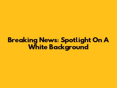 Breaking News: Spotlight On A White Background